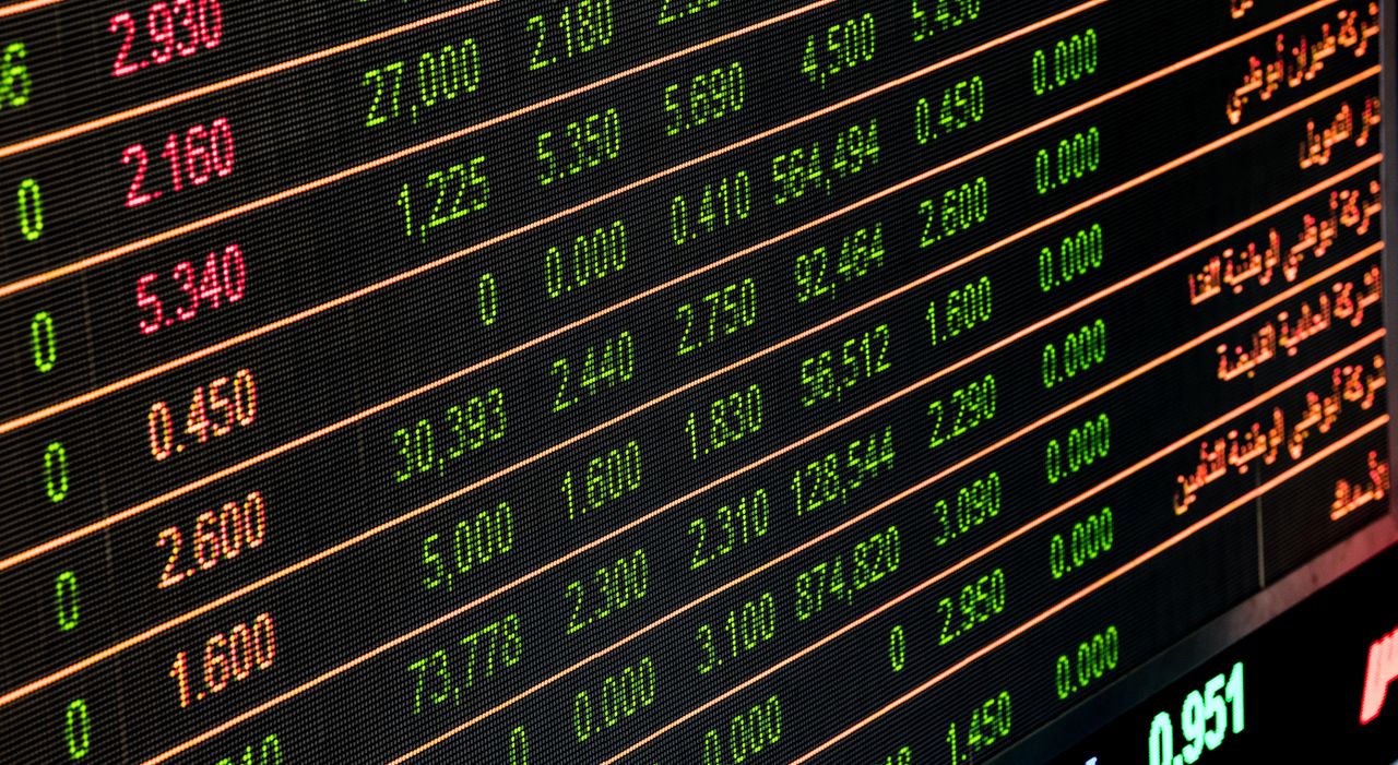 services-02 Detailed view of a stock market screen showing numbers and data, symbolizing financial trading.