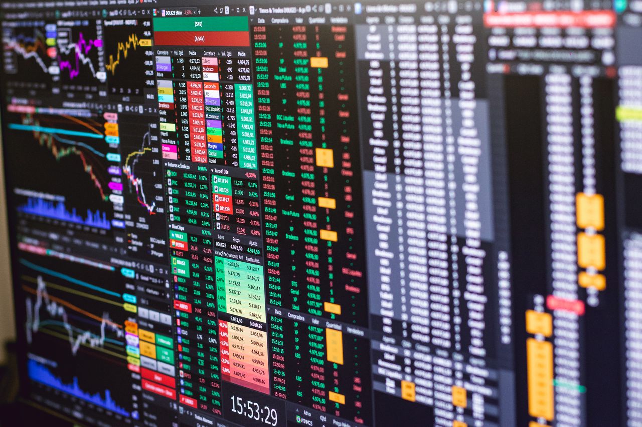 hero-img-02 Detailed financial trading screen with colorful charts and data representing market fluctuations.