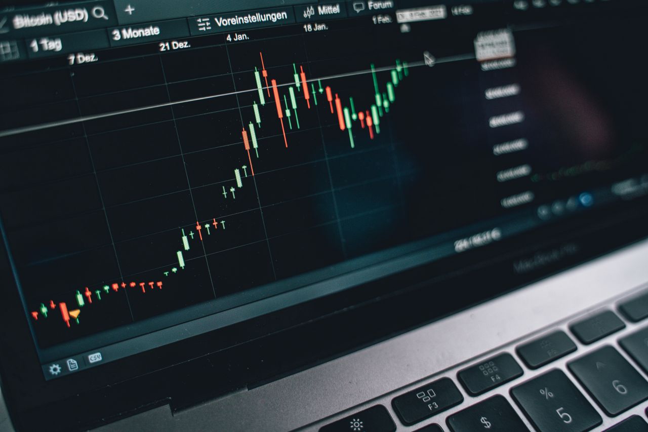about-01 Close-up of a computer screen displaying cryptocurrency market trends and data.